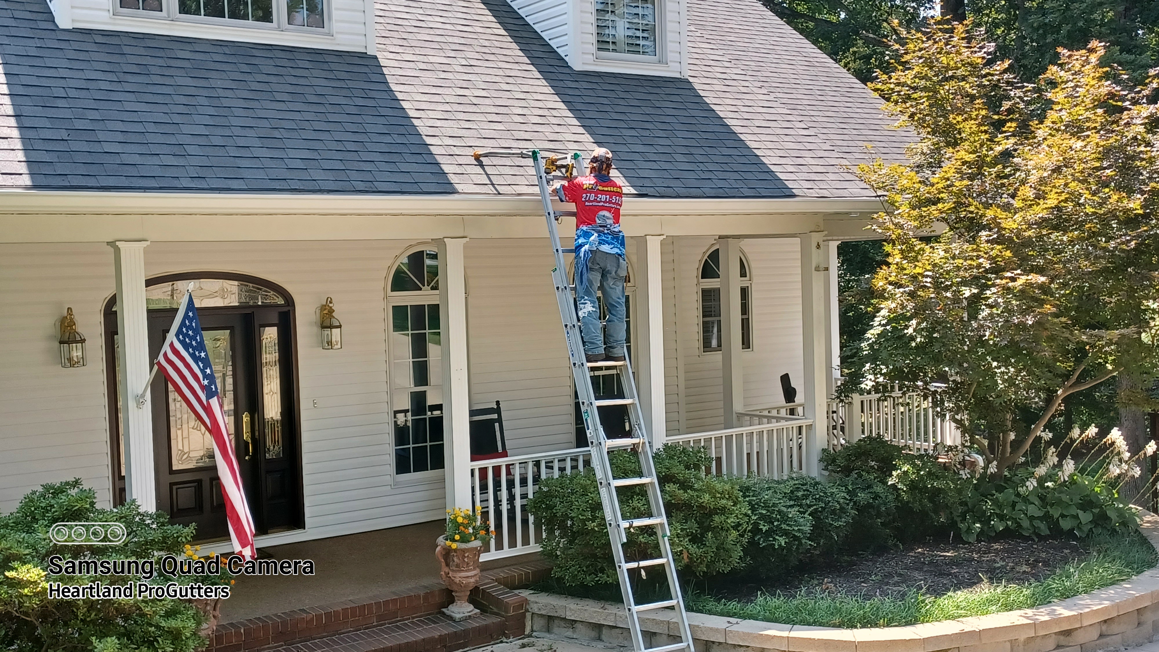 Replacing old loose gutter spikes with modern hidden hangers to fix a sagging gutter system on a home in Western Kentucky.