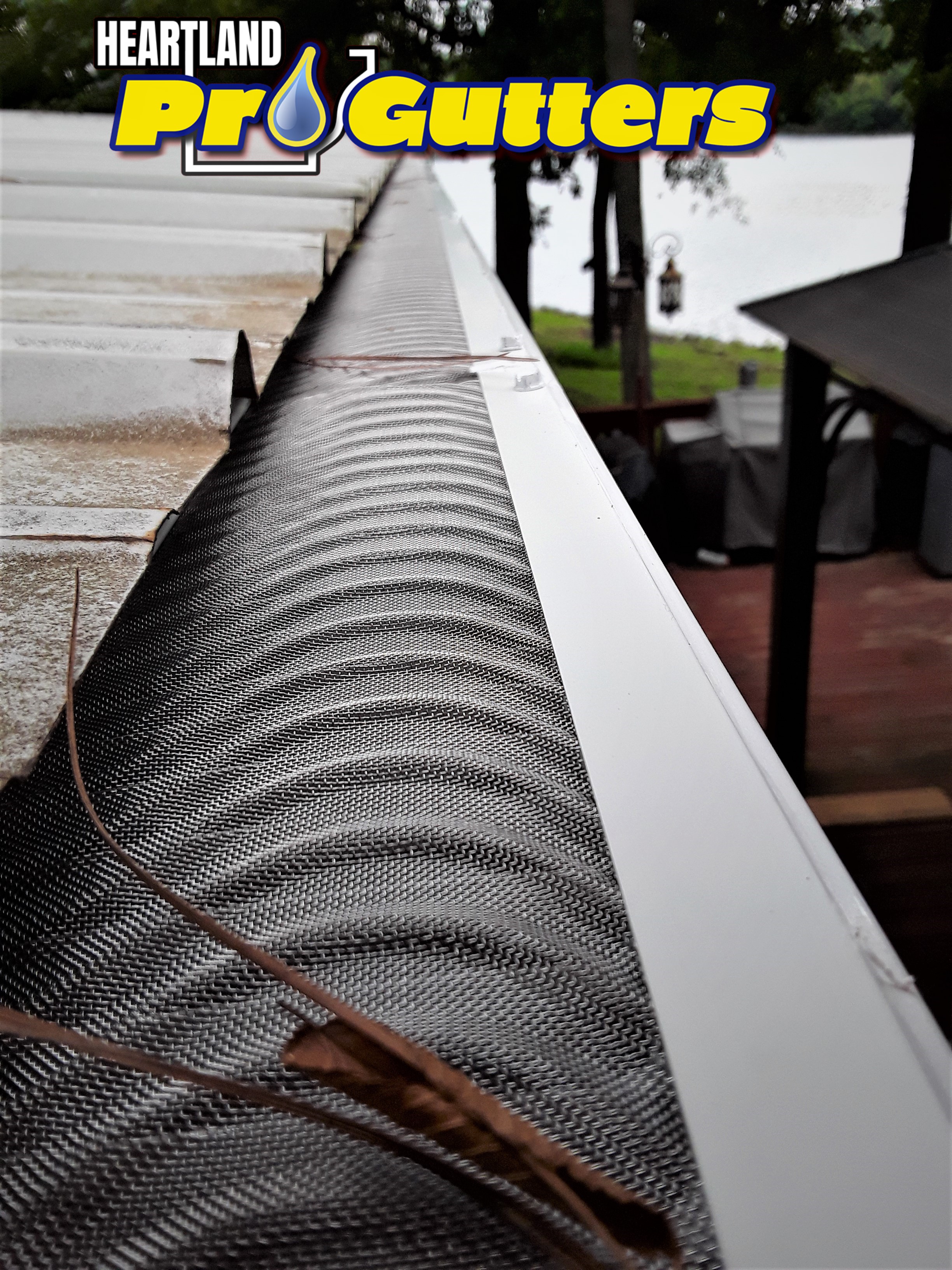 High-quality gutter guard system installed on a residential home preventing leaf clogging.
